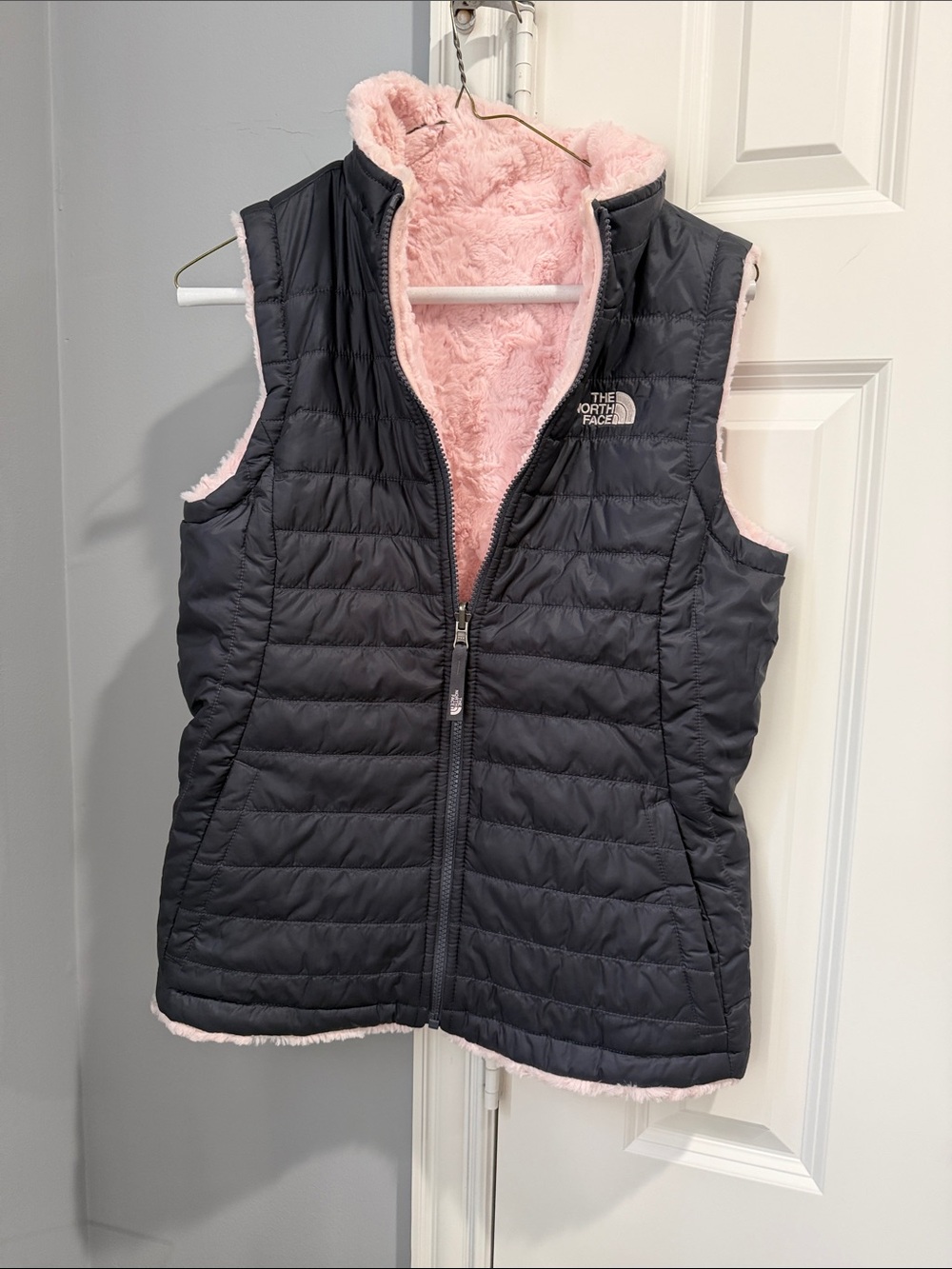 The North Face Black Quilted Vest with Pink Fleece Interior